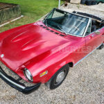 fiat-124-spider-1800-rossa-interni-neri-crs-1975fiat-124-spider-1800-1975-rossa-auto-storica-crs